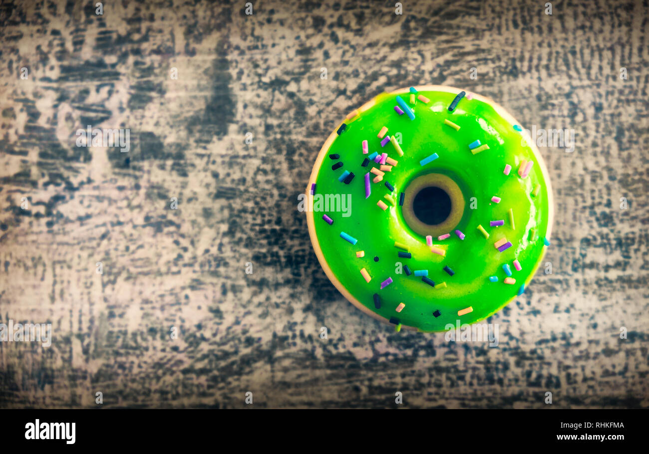 Sfondo di ciambella rabboccare vista giocattolo verde tonica foto Foto Stock