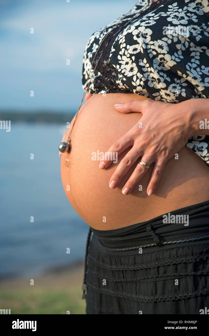 Dolce bella pancia in gravidanza Foto Stock