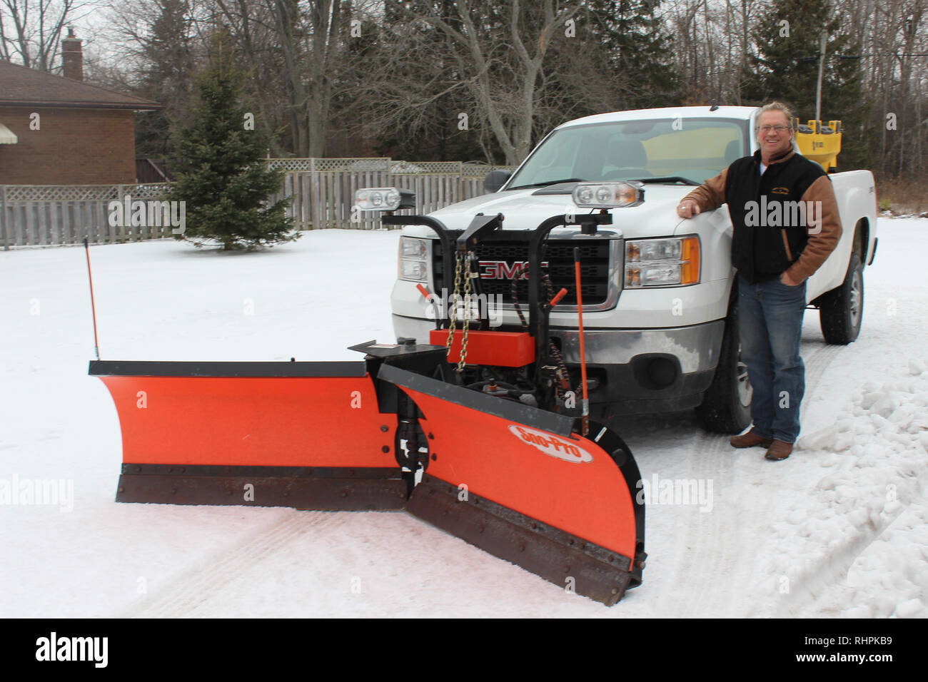 Snow Plough business operatore Foto Stock