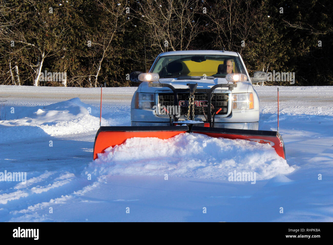 Snow Plough business operatore Foto Stock