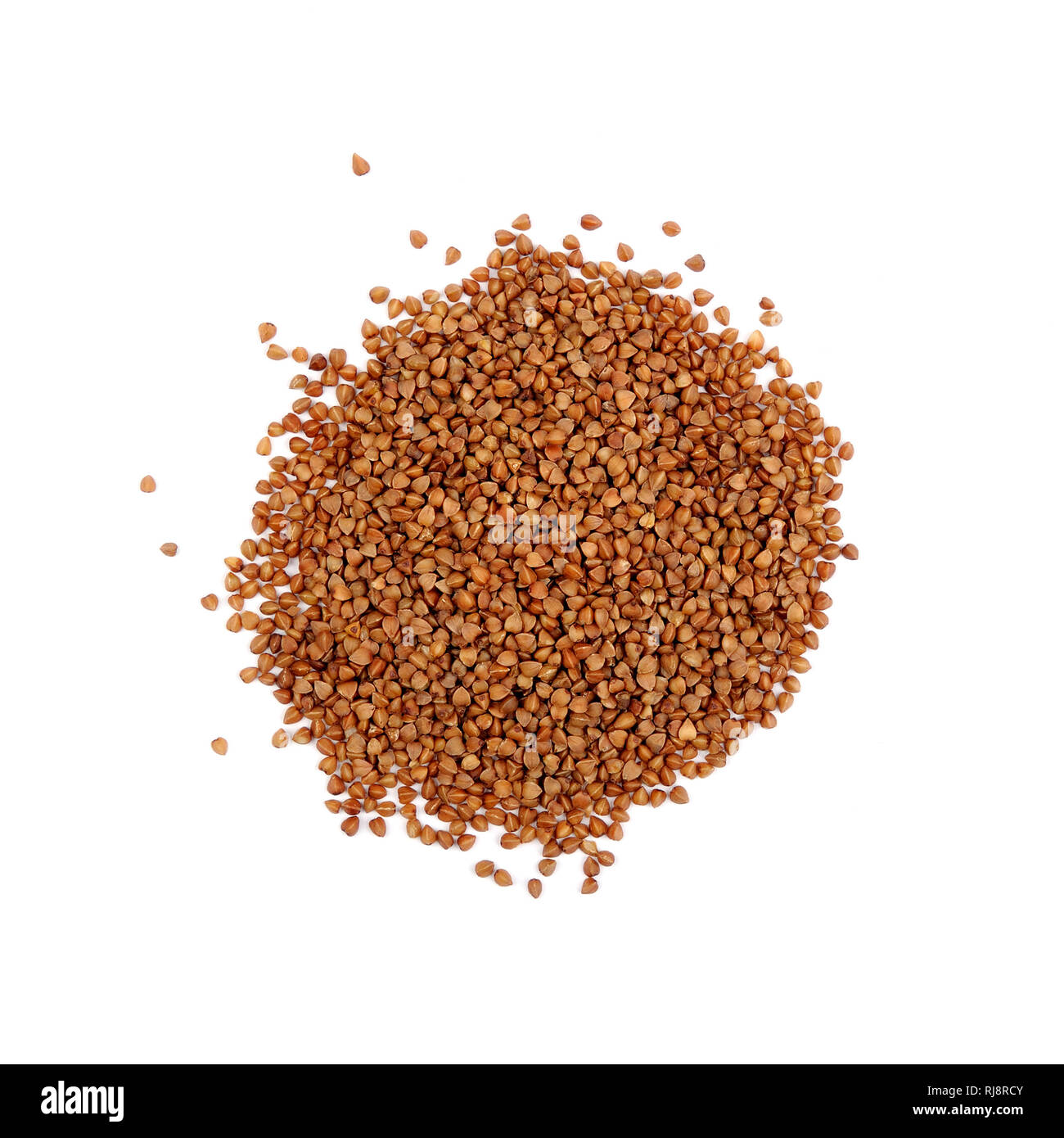 Cumulo di marrone chicchi di grano saraceno.grano non contiene glutine, essa può essere mangiato da persone con glutine-disturbi correlati. Utile naturale prodotto dietetico. Guarire Foto Stock