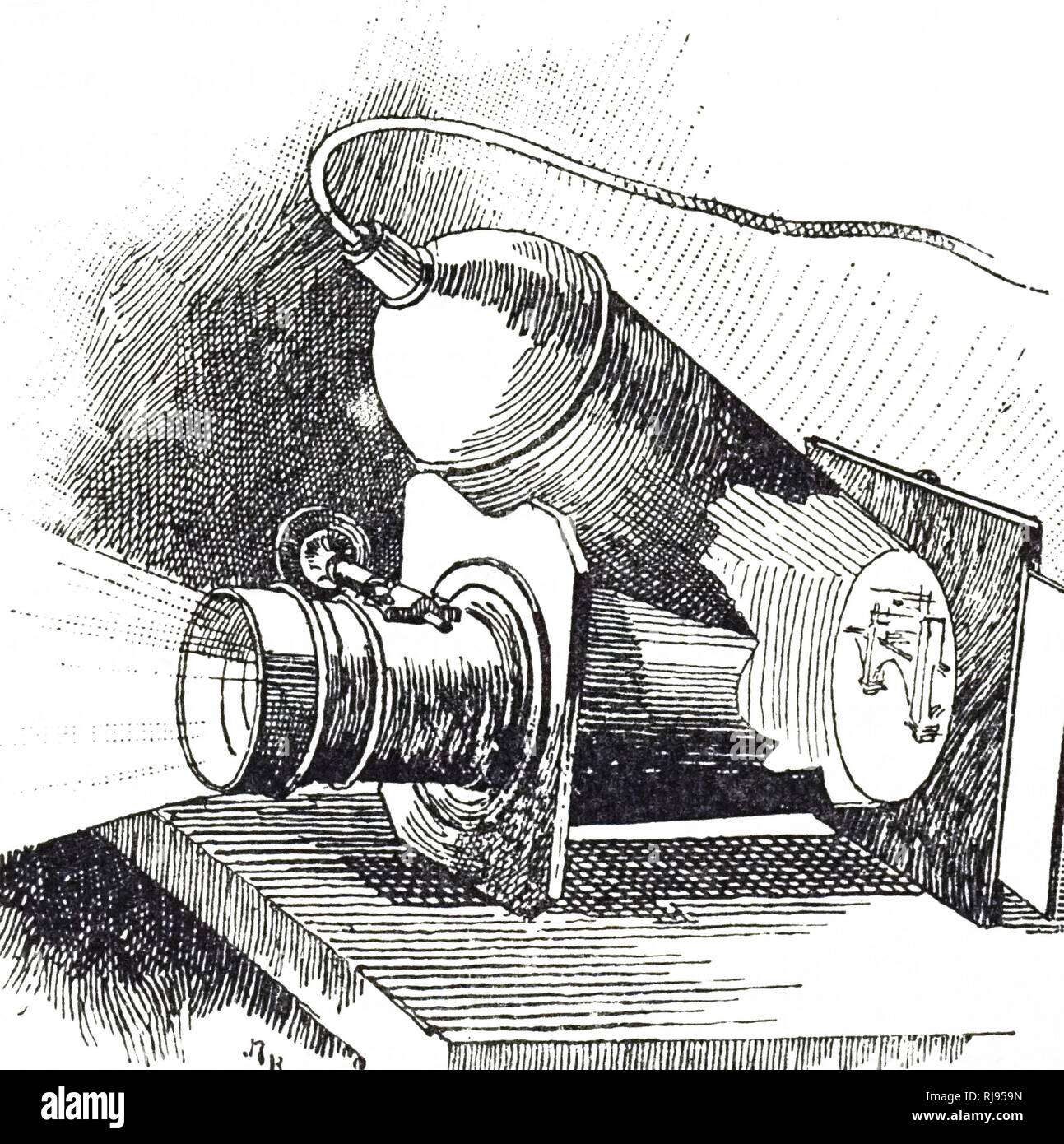 Una incisione raffigurante il Trouve Auxanoscope per la proiezione di medaglie, disegni e fotografie su uno schermo. La luce era una lampada ad incandescenza lampada elettrica alimentata da quattro celle di bicromato. Gustave Trouve (1839-1902) un elettrico francese ingegnere e inventore. Datata del XIX secolo Foto Stock