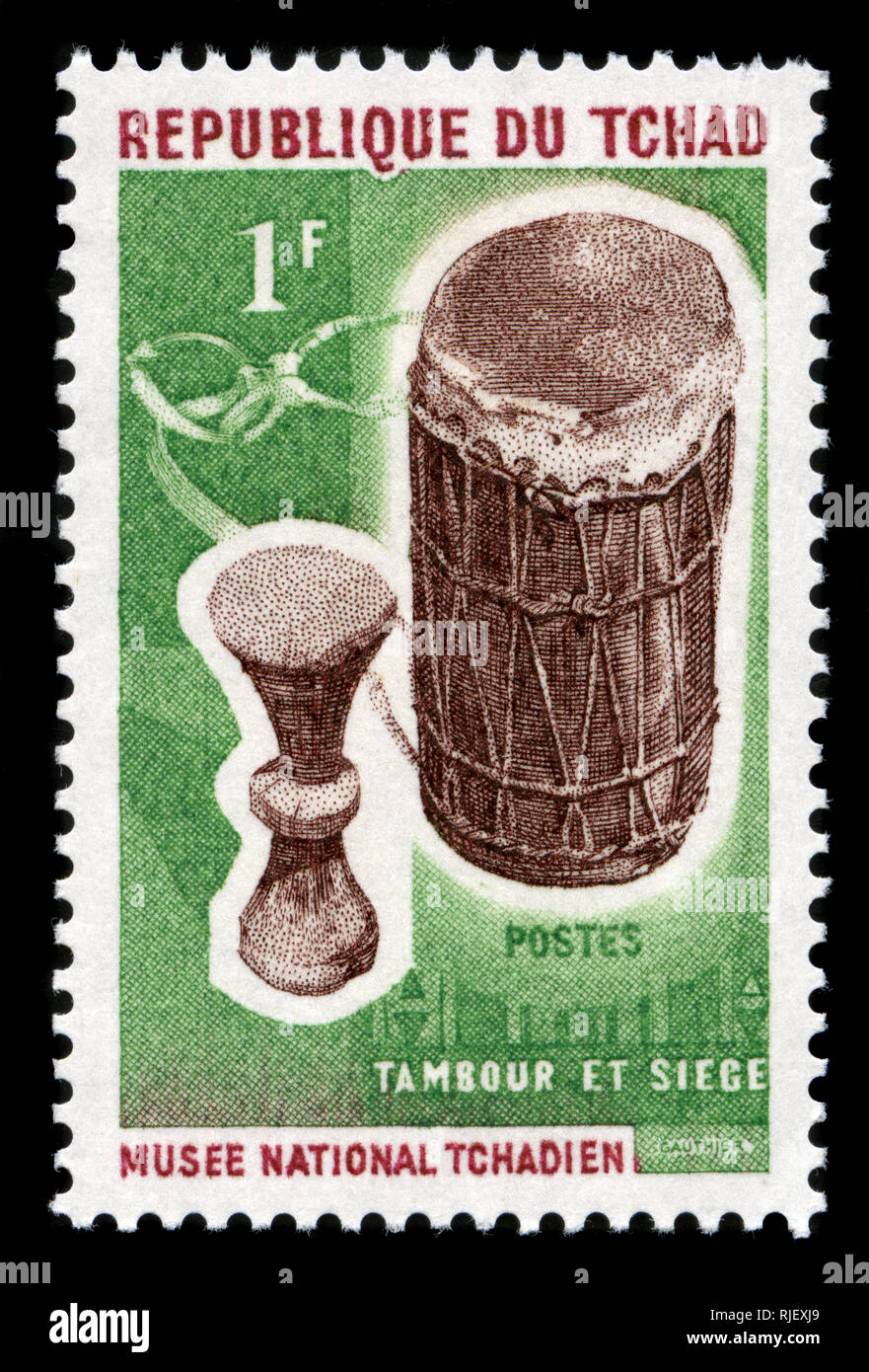 Con timbro postale timbro dal Ciad in strumenti musicali serie emessa nel 1965 Foto Stock
