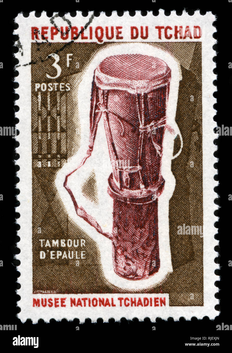 Con timbro postale timbro dal Ciad in strumenti musicali serie emessa nel 1965 Foto Stock