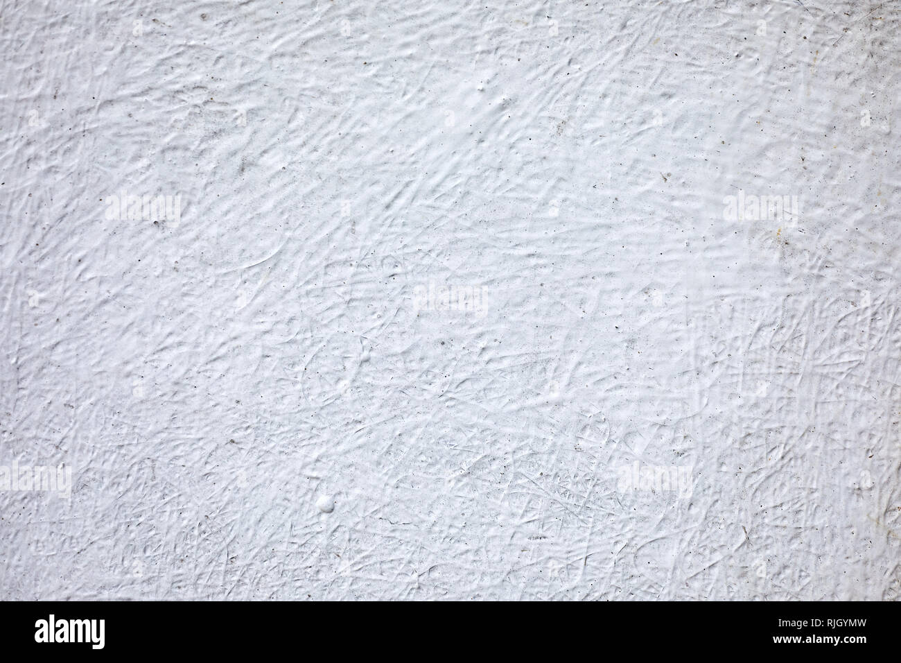 Vecchio, bianco, cemento intonacato di pietra e la tessitura della parete di cemento. Sfondo. Foto Stock