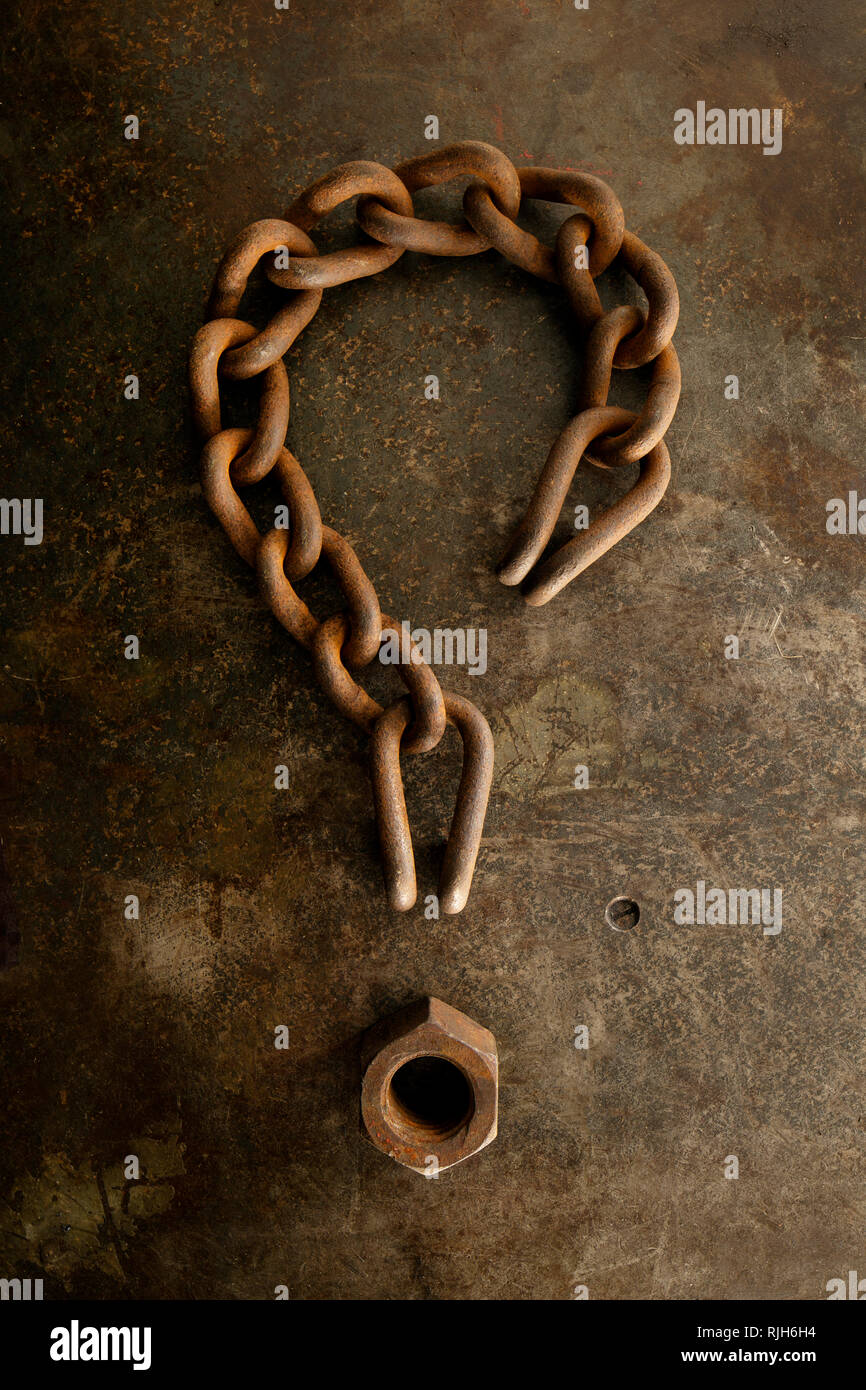 Rusty catena a forma di punto interrogativo Foto Stock