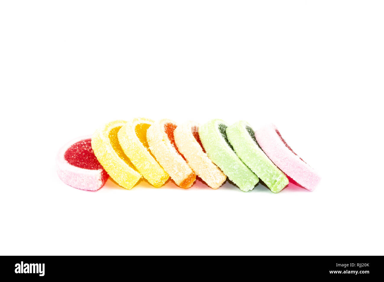 Caramelle colorate come un delizioso snack Foto Stock