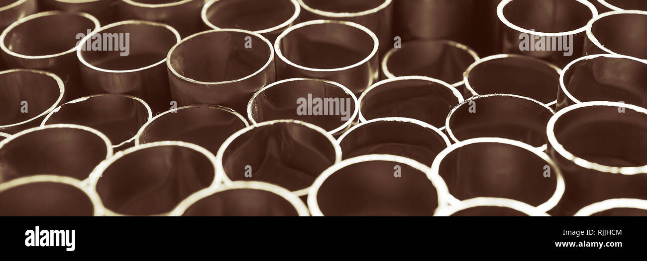 La sezione dei tubi metallici. Industria metallurgica concetto sfondo Foto Stock