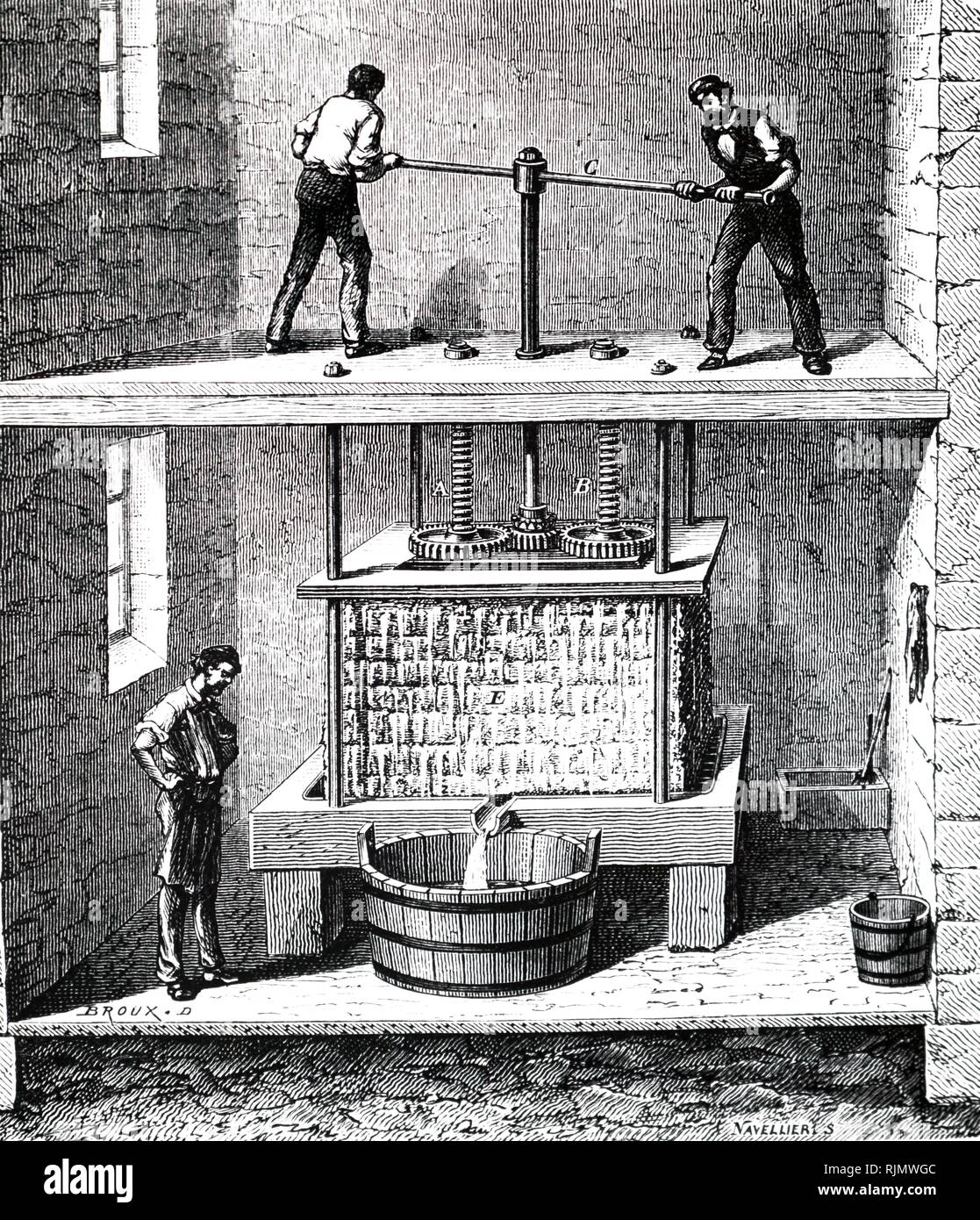 Una incisione raffigurante il francese sidro premere. 1870 Foto Stock