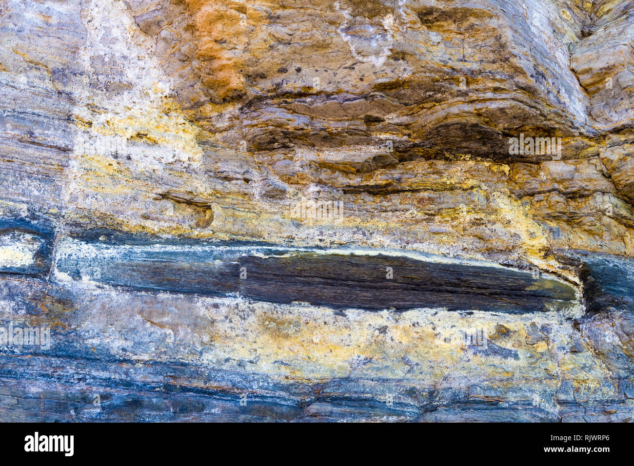 Pietre colorate texture di sfondo, formazione astratta di minerale di roccia in ambiente marino Foto Stock
