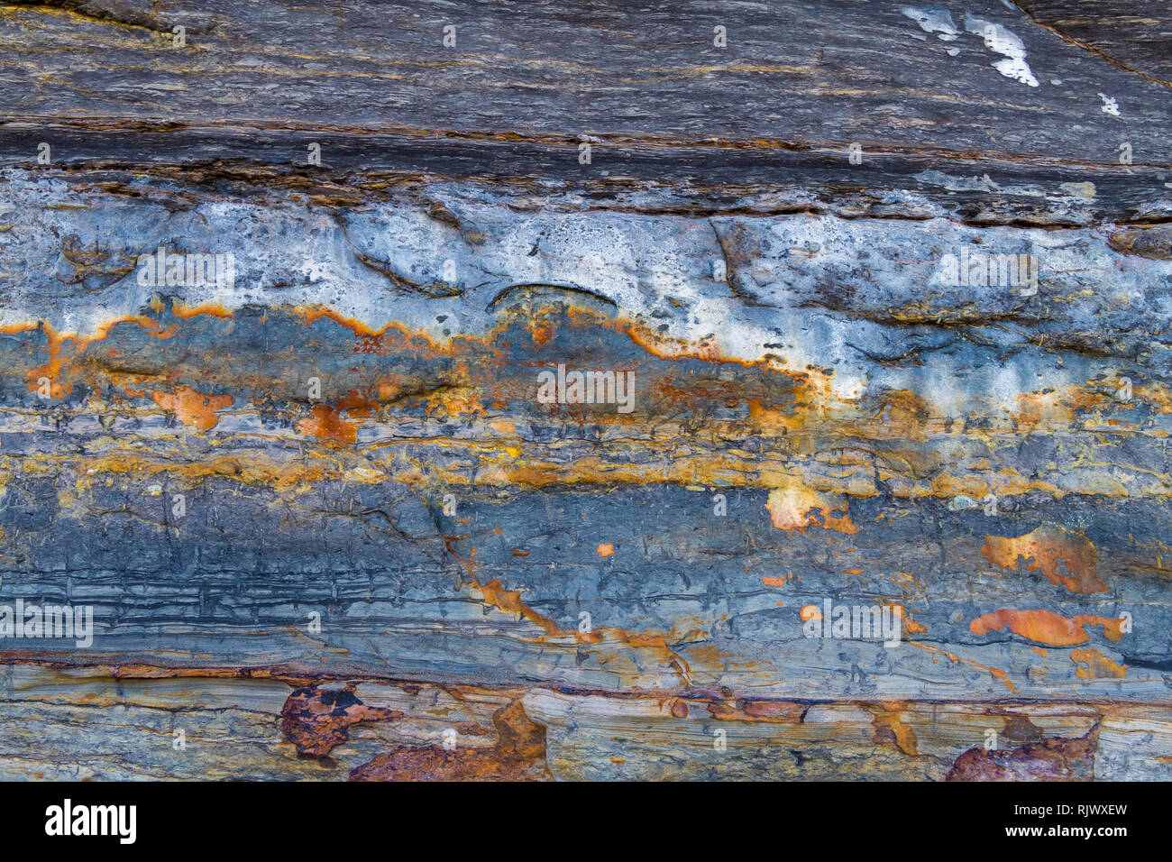 Pietre colorate texture di sfondo, formazione astratta di minerale di roccia in ambiente marino Foto Stock