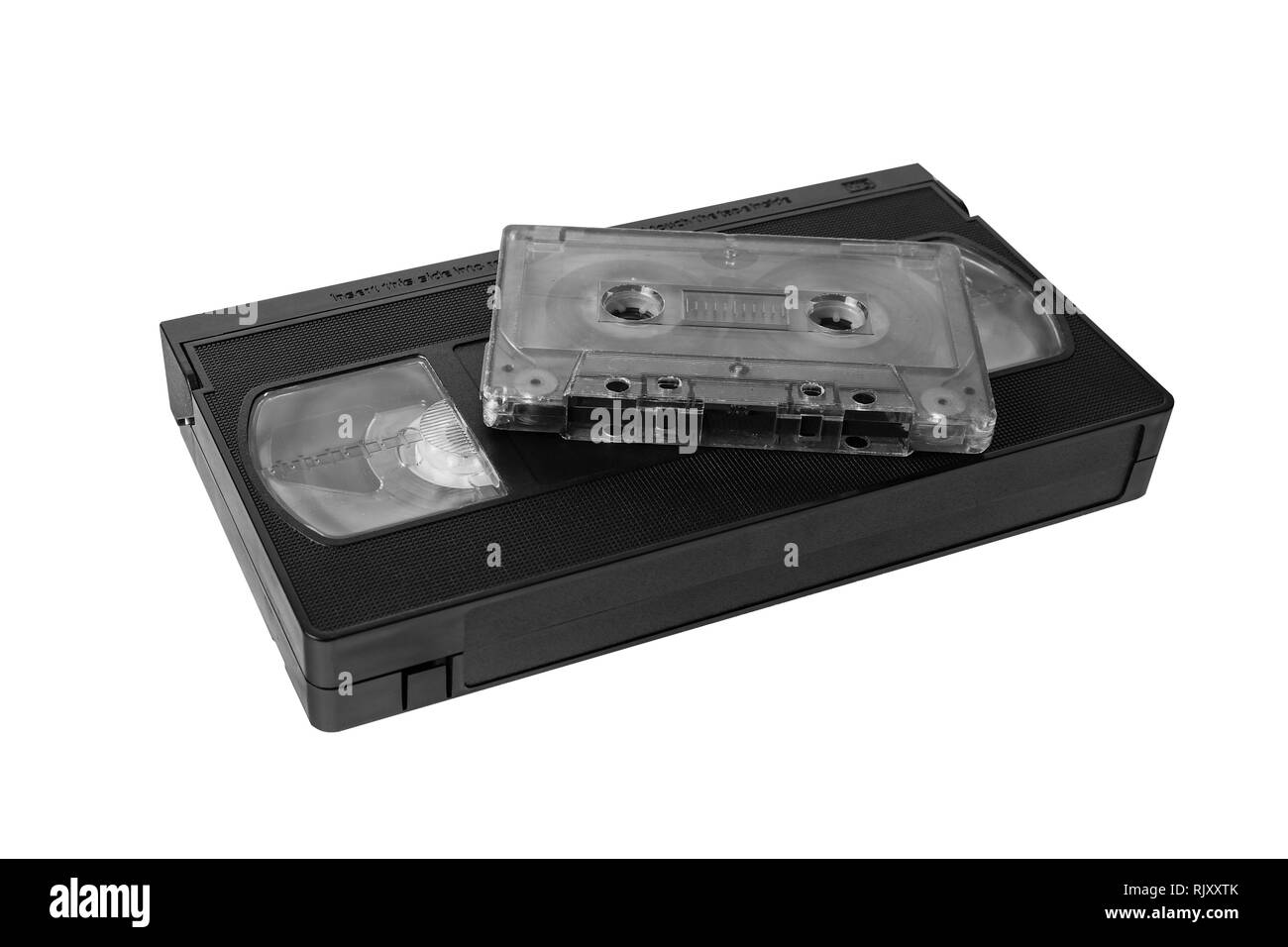 Nastro audio cassette VHS e video cassetta a nastro su sfondo bianco, isolato Foto Stock