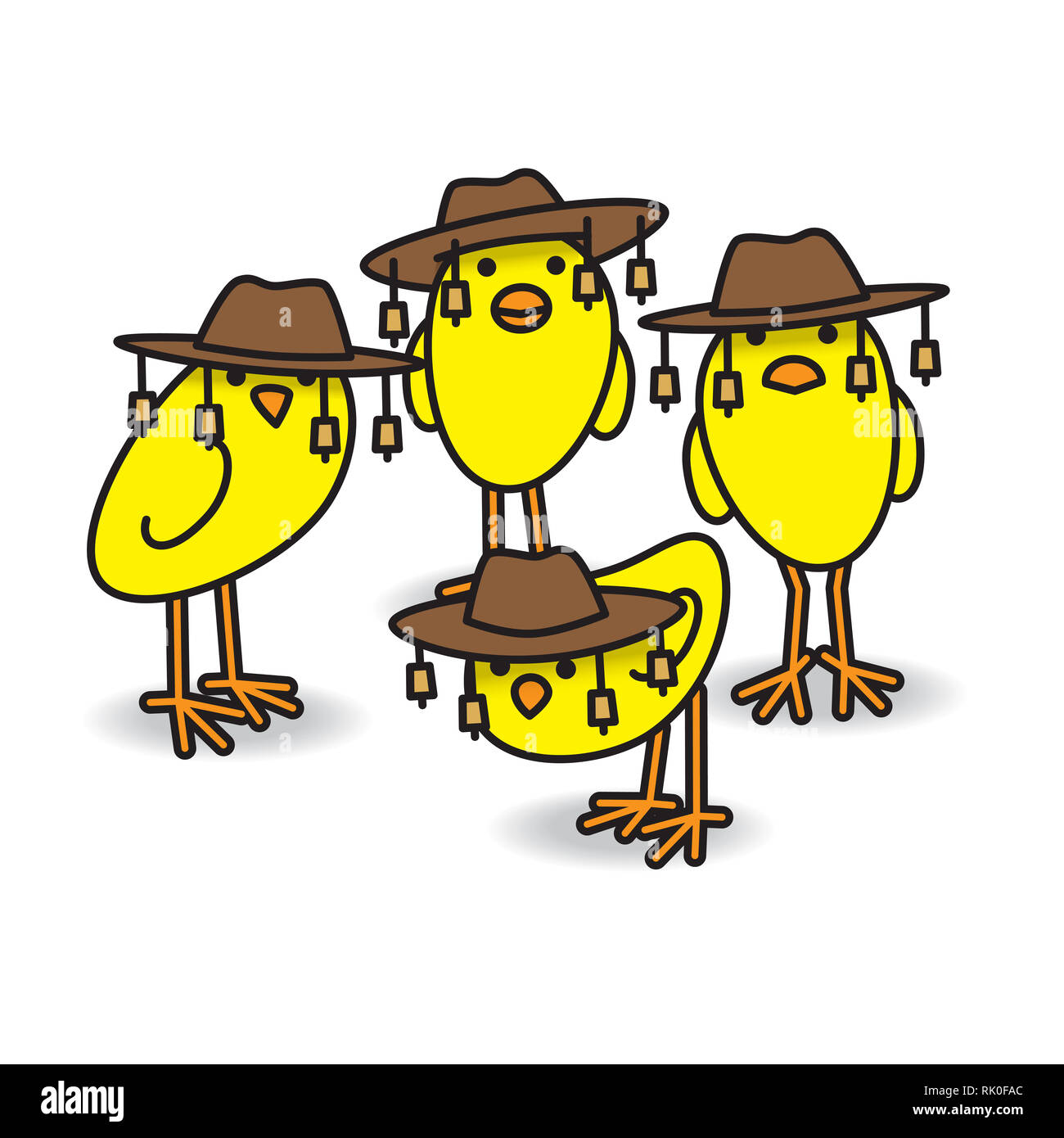 Quattro giallo Aussie pulcini lo sguardo verso la telecamera indossando il tradizionale bush australiano cappelli Foto Stock