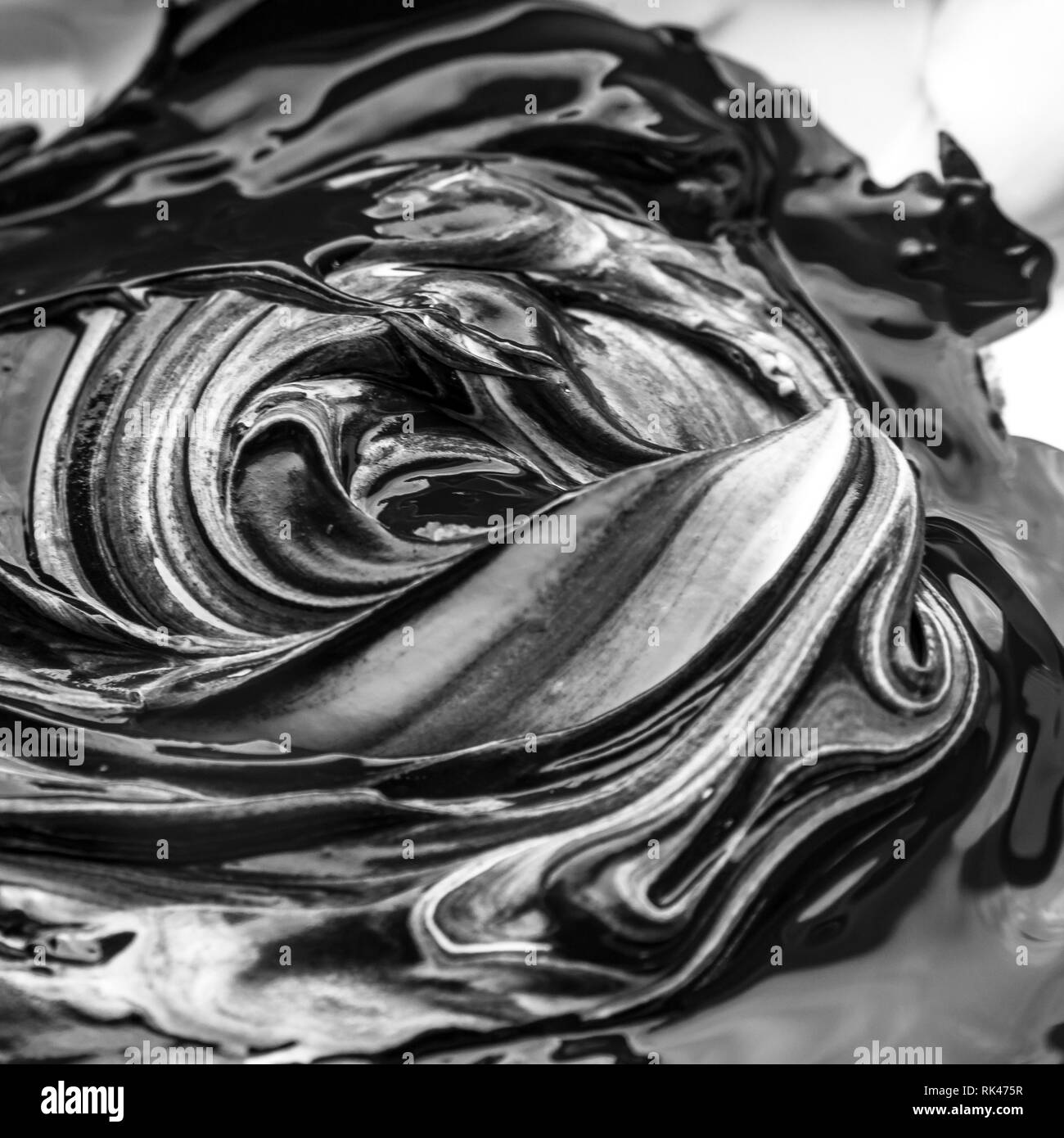 Abstract in bianco e nero artwork come risultato della miscelazione di vernice Foto Stock