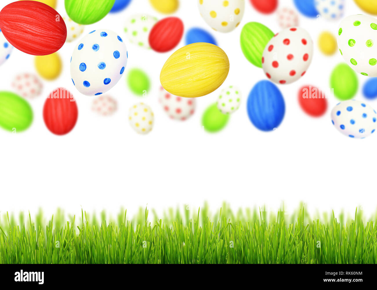 Cololrful uova di Pasqua che cade a erba verde su sfondo bianco Foto Stock