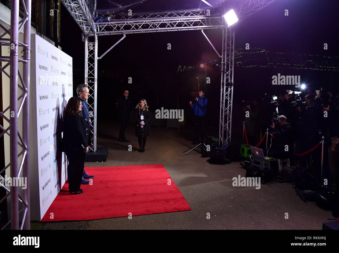 Melissa McCarthy e Richard E. concedere frequentando il Nespresso British Academy Film Awards Nominees' Party al Kensington Palace di Londra. Foto Stock