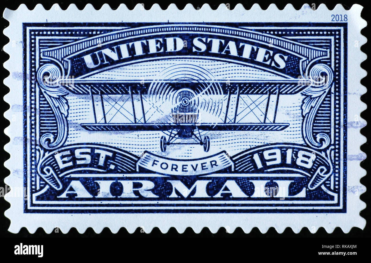 Vecchio biplano su american air mail francobollo Foto Stock