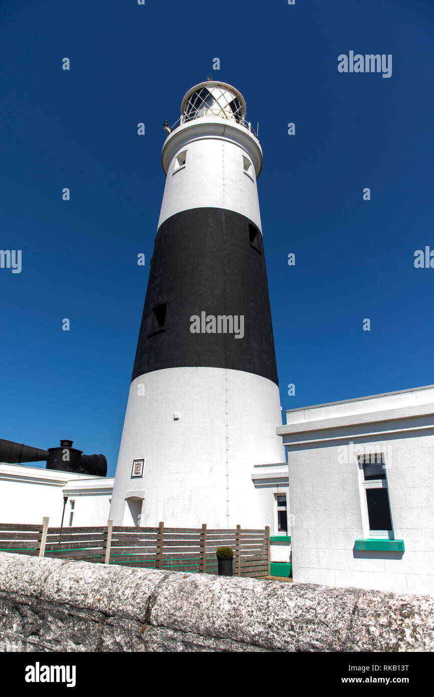 Il mannez faro con cielo blu chiaro per una copia dello spazio. Foto Stock