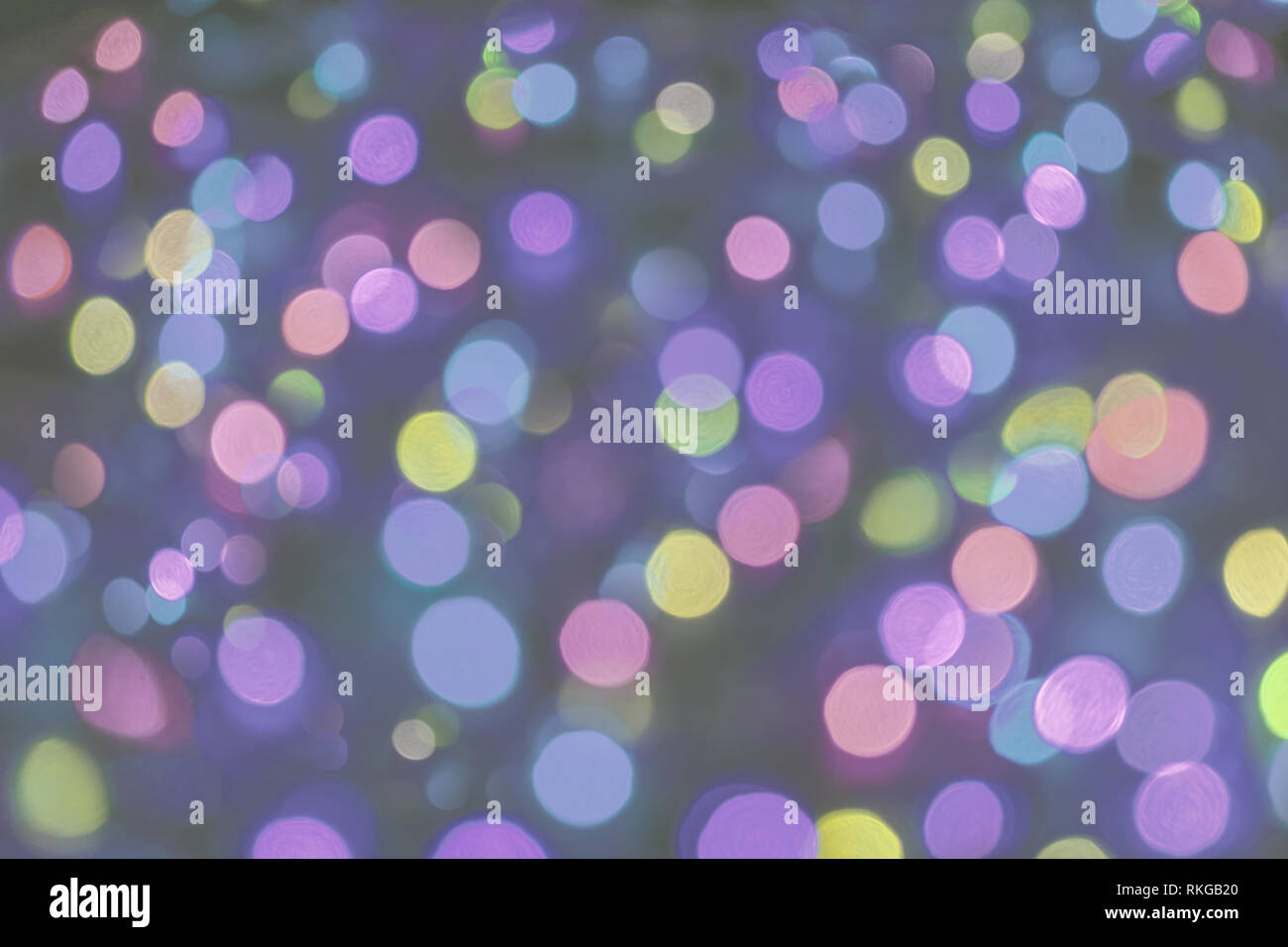 Blu porpora luci sfocate per l'anno nuovo sfondo di decorazione Foto Stock