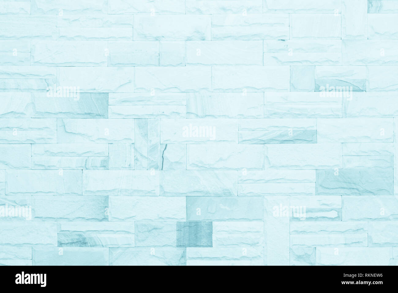 I colori blu e bianco muro di mattoni arte calcestruzzo o pietra texture di sfondo carta da parati in astratto di calcare la vernice per pavimenti e i compiti di scuola/muratura o Foto Stock
