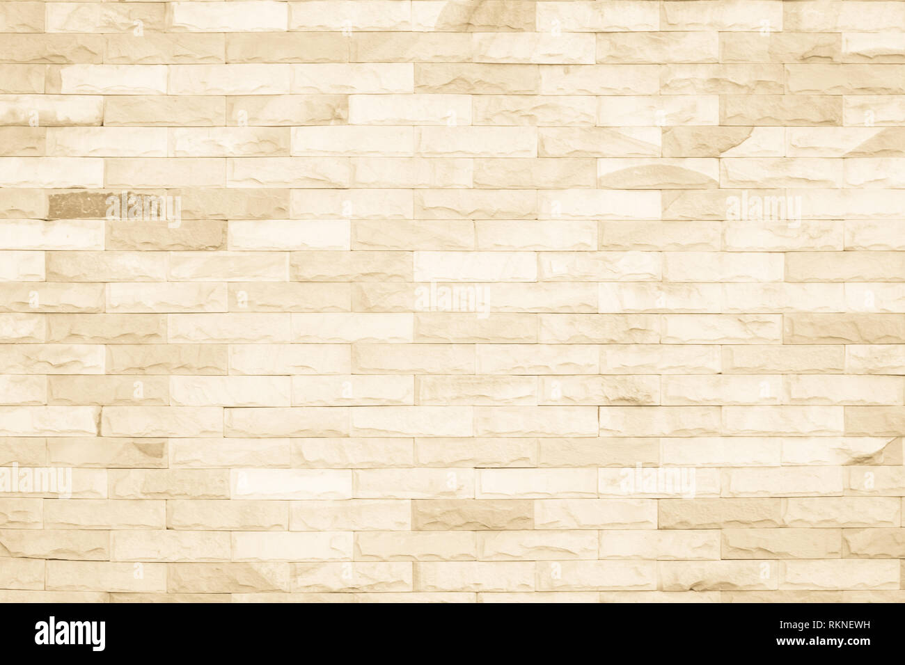 Colori crema e bianco muro di mattoni arte calcestruzzo o pietra texture di sfondo carta da parati in astratto di calcare la vernice per pavimenti e i compiti di scuola/muratura o Foto Stock