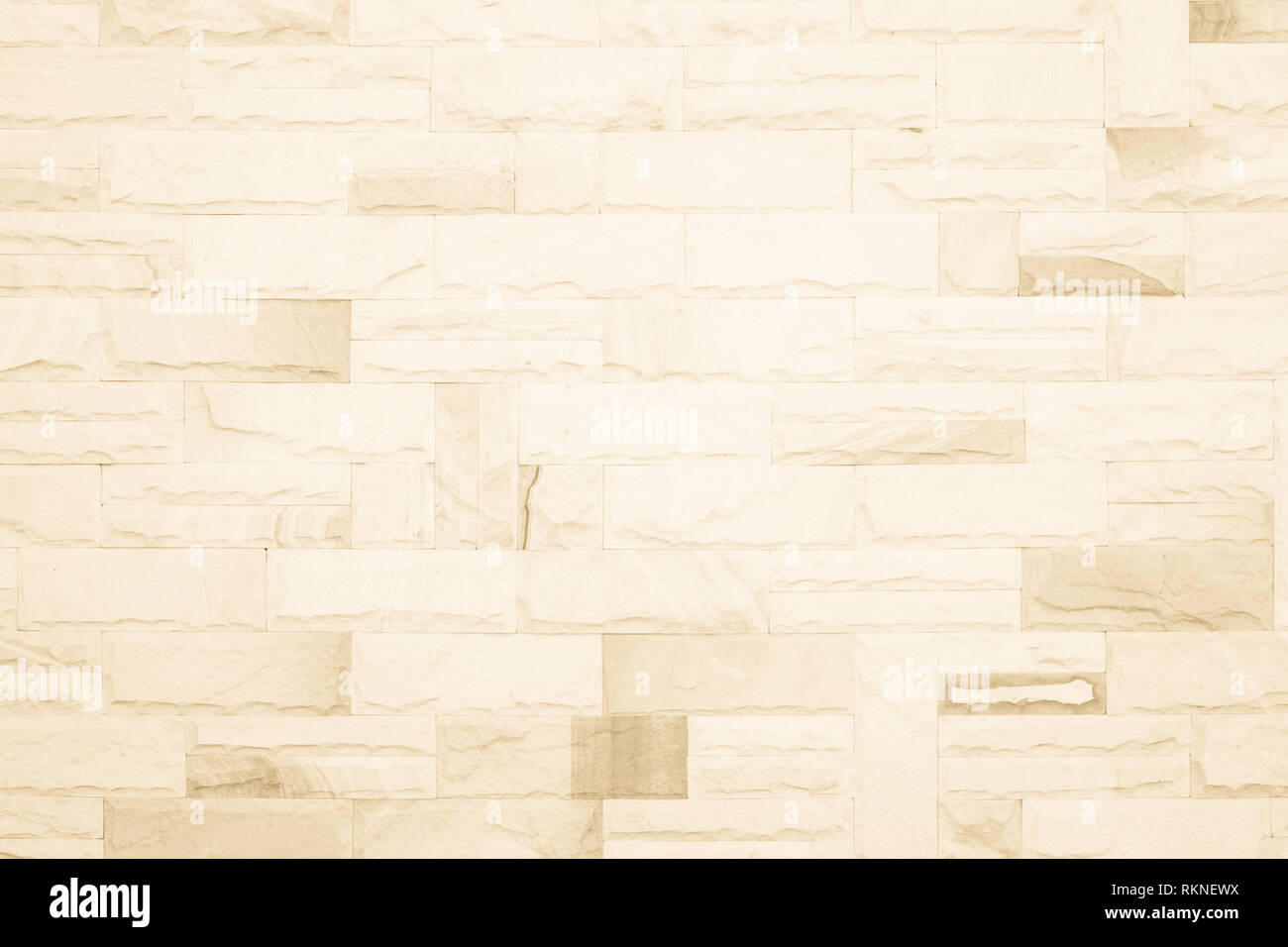 Colori crema e bianco muro di mattoni arte calcestruzzo o pietra texture di sfondo carta da parati in astratto di calcare la vernice per pavimenti e i compiti di scuola/muratura o Foto Stock