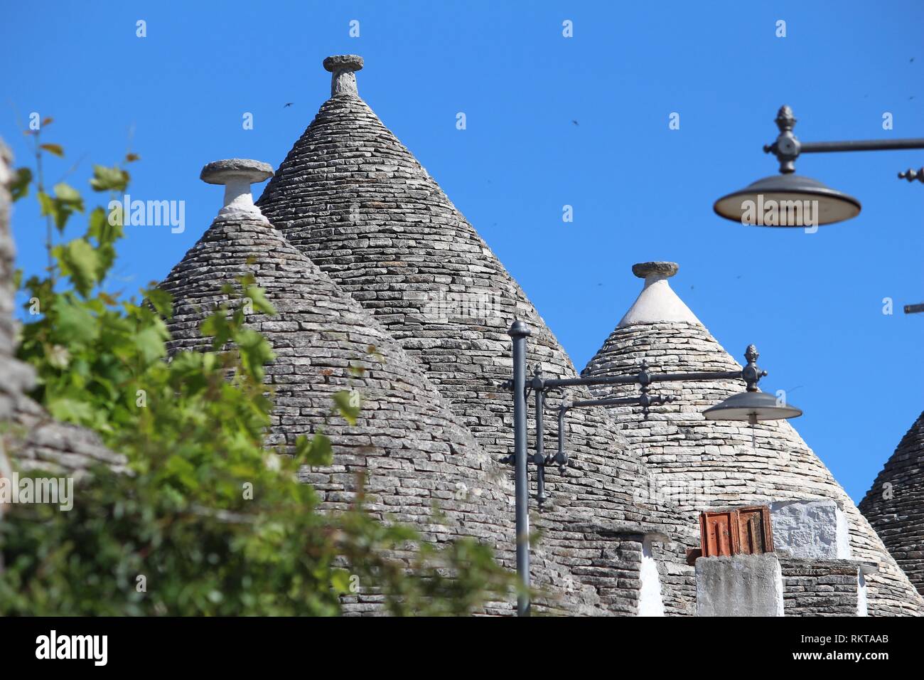 Alberobello case tradizionali - trulli. Regione Puglia. Punto di riferimento italiano. Foto Stock