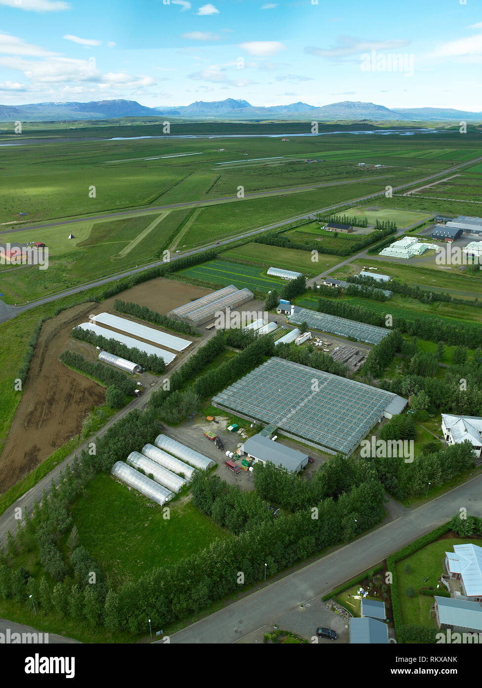 Serre e terreni agricoli, Fludir, Islanda Foto Stock