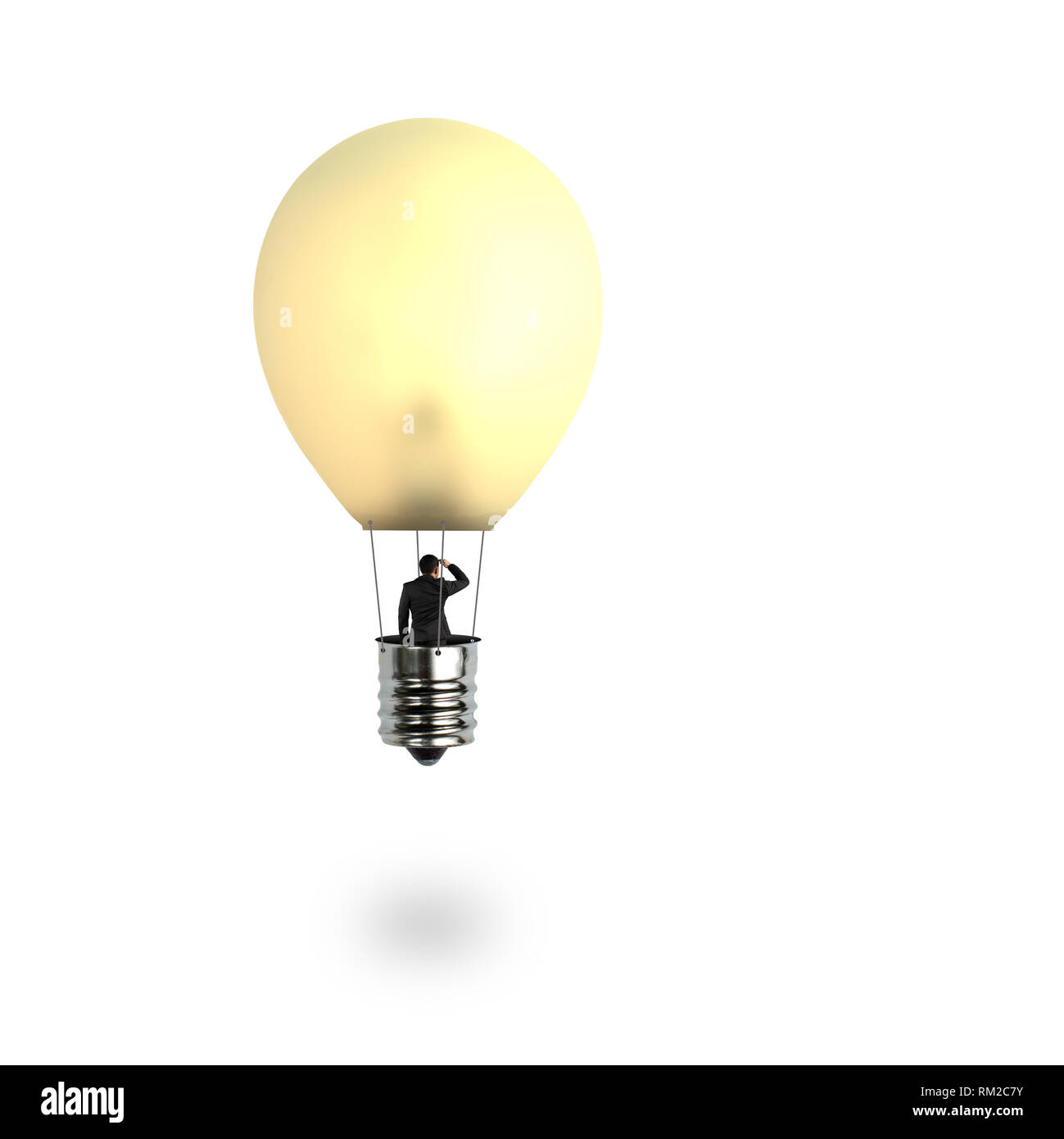 L'uomo prendendo la lampada incandescente palloncino guardando il luogo distante, isolato in uno sfondo bianco Foto Stock
