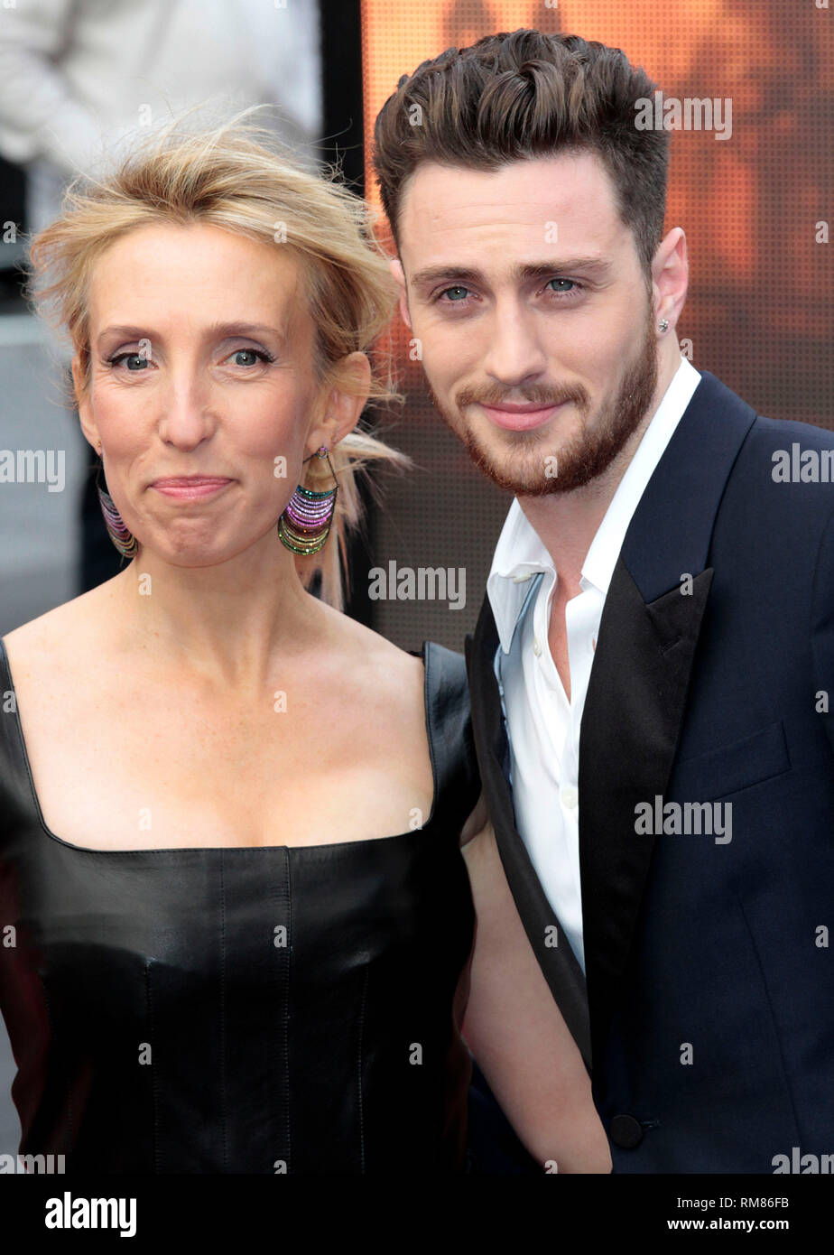Londra, UK, 11 maggio 2014 Aaron Taylor Johnson; Sam Taylor Wood arriva a Premiere Europeo di 'Godzilla' di Odeon Leicester Square a Londra, Eng Foto Stock