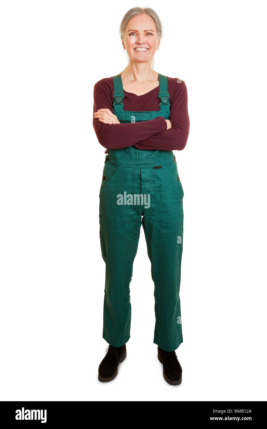 Donna sorridente come un giardiniere in abiti da lavoro con salopette da  verde Foto stock - Alamy