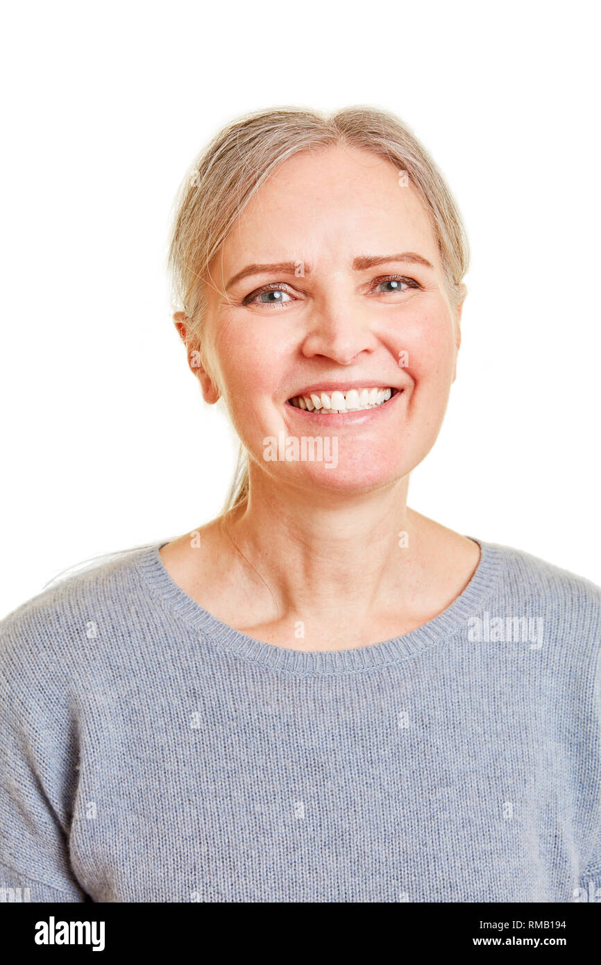 Faccia di un ridere donna anziana dalla parte anteriore Foto Stock