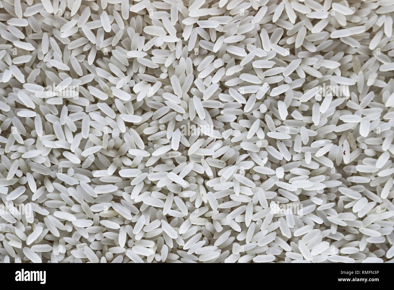 La texture riso a grani lunghi. Semole e semolini di riso. Foto Stock