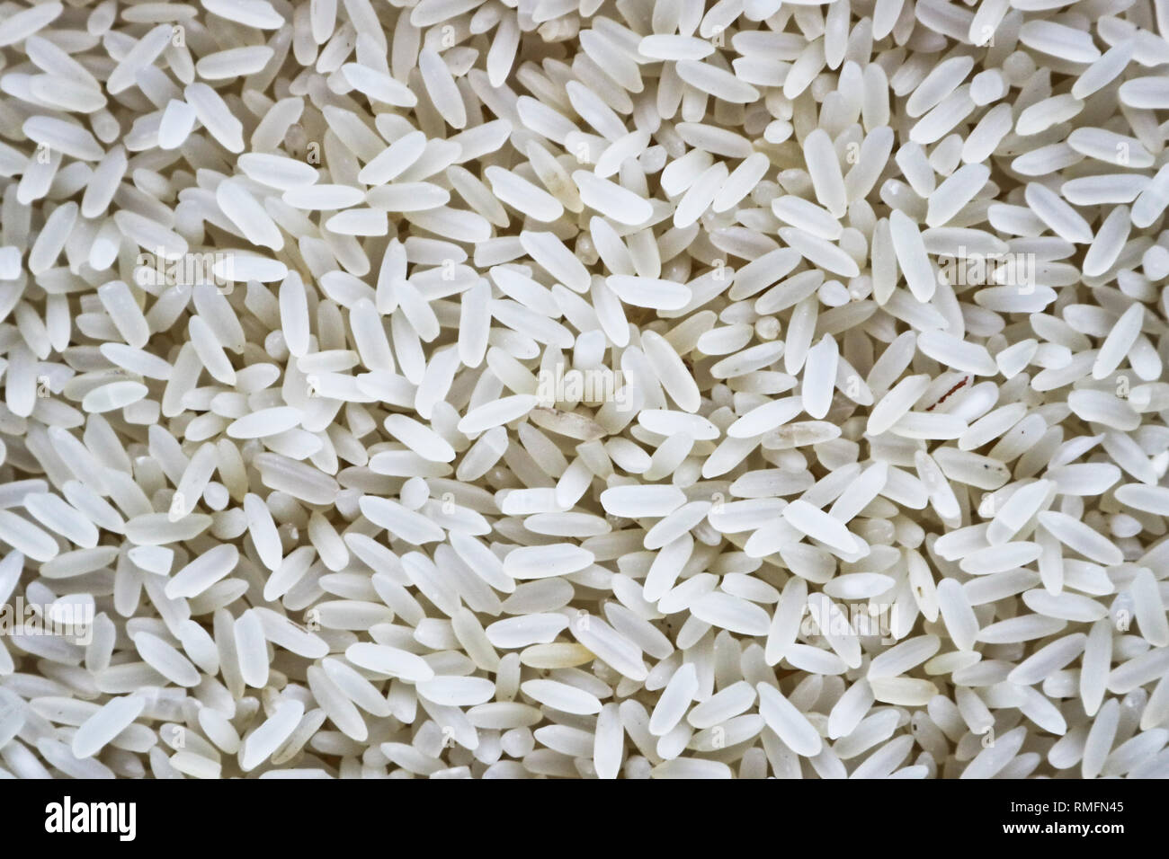 La texture riso a grani lunghi. Semole e semolini di riso. Foto Stock