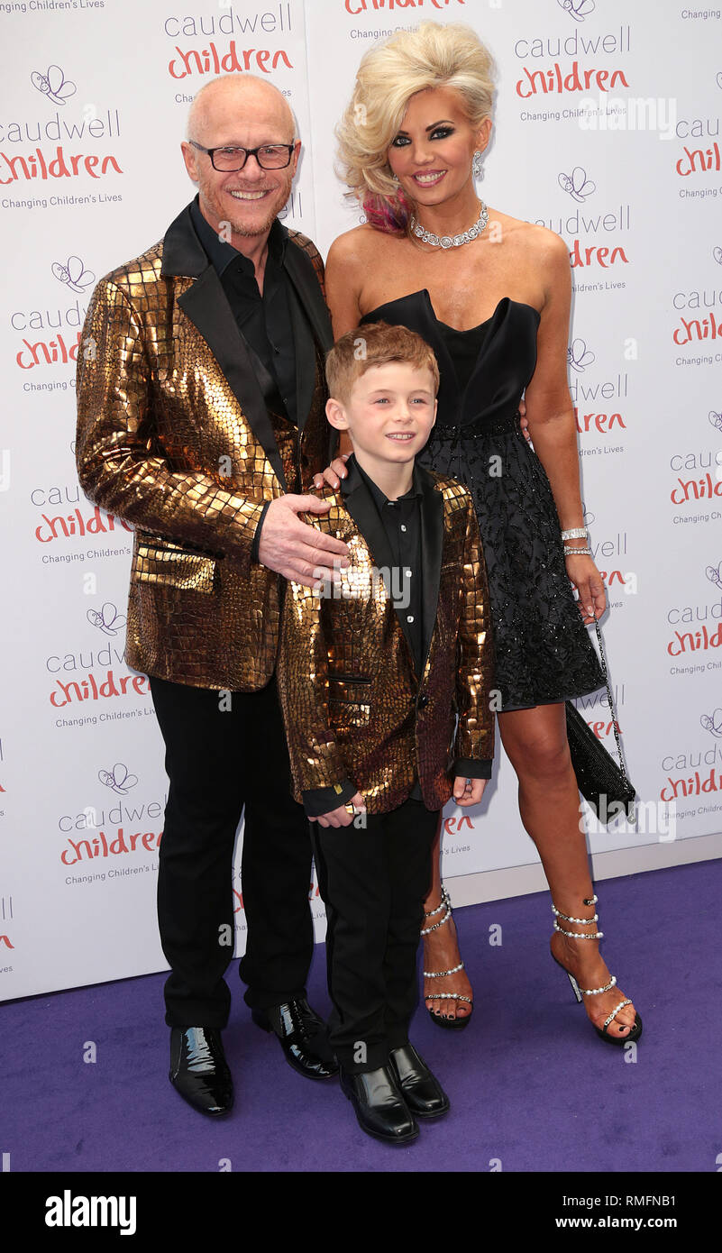 Londra, UK, 15 maggio 2014 Giovanni Caudwell con Claire Johnson e il loro figlio presso i bambini Caudwell Butterfly Palla al Grosvenor House Hotel - e Foto Stock