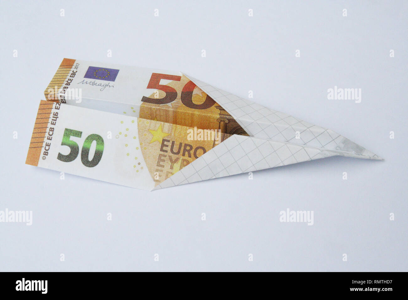 Euro paper di bill. Aeroplano di carta fatta di euro bill. Aeroplano di carta fatta di valuta euro bill. Foto Stock