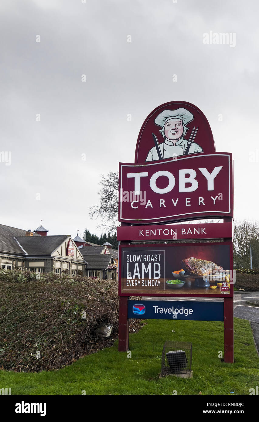 Toby Carvery segni sul Mitchells e maggiordomi pub della catena alimentare. Foto Stock