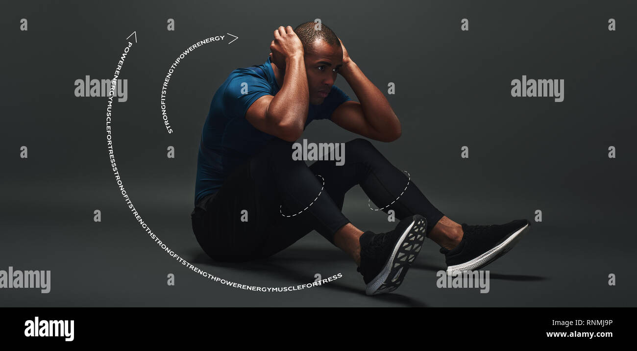 Dark scuoiati uomo in abbigliamento sportivo è concentrata durante il funzionamento del sistema ABS, giacente su sfondo scuro. Lunghezza intera. Disegno grafico. Foto Stock