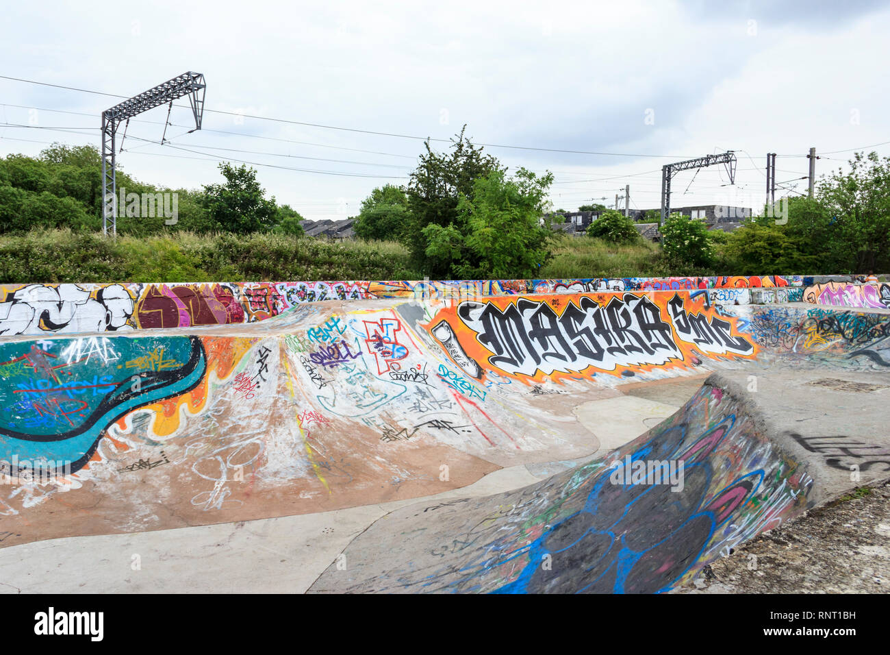 Il liquame vittoriano letti filtranti di Markfield (parco, ora utilizzato come una bicicletta e impianto di skateboard e decorato con graffiti, Tottenham, London, Regno Unito Foto Stock
