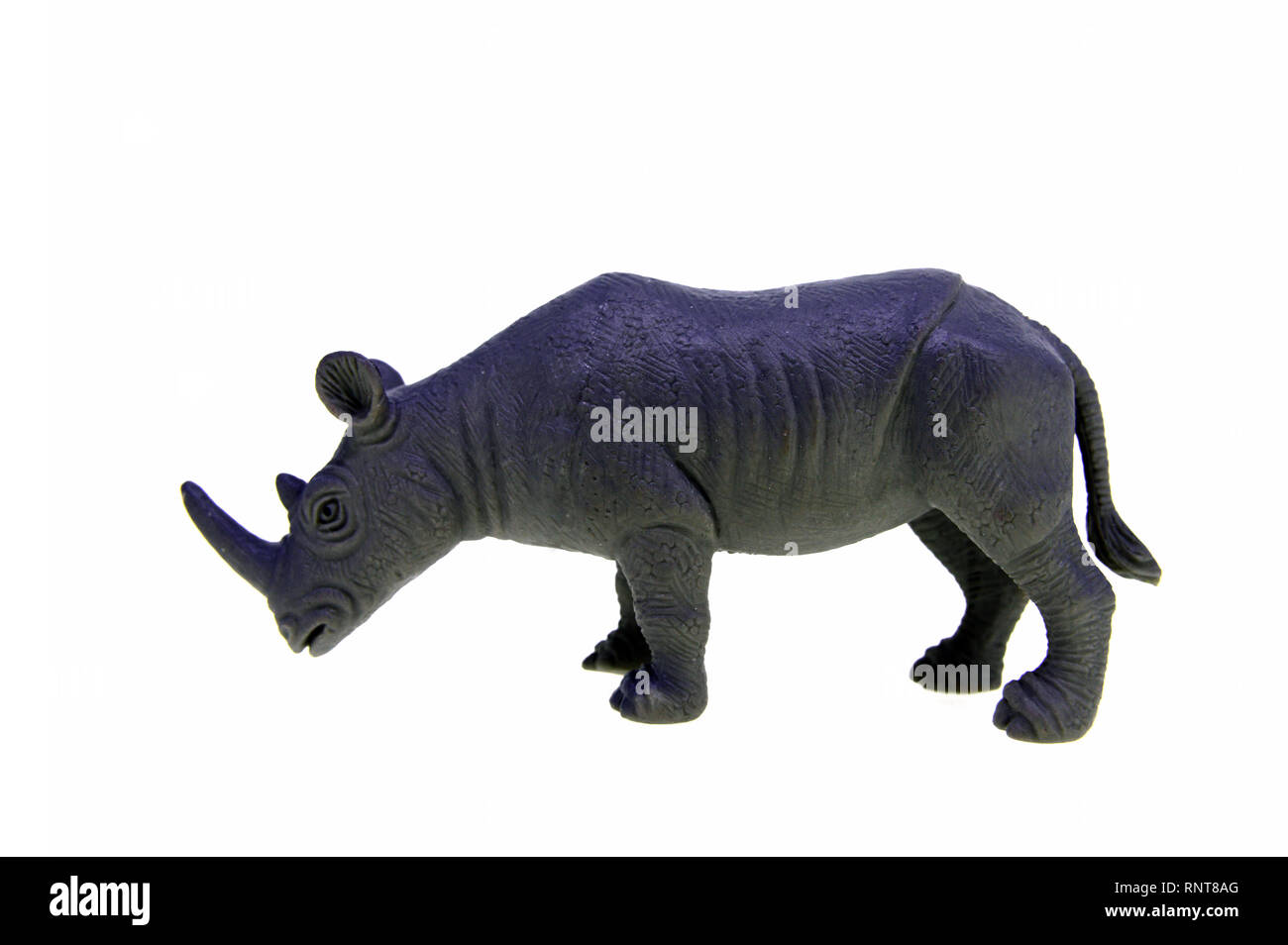 Giocattolo di plastica rhino isolate su sfondo bianco Foto Stock