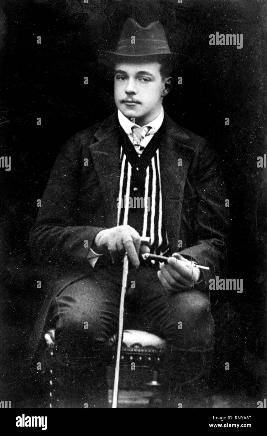 Re Manuel seduto con la canna da zucchero Foto Stock