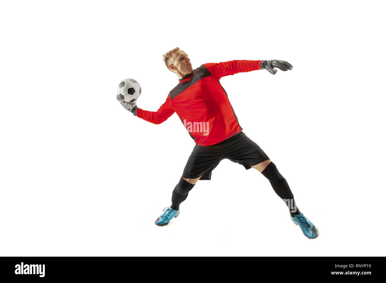 Un giocatore di calcio portiere uomo gettando la sfera. Silhouette isolato su bianco di sfondo per studio Foto Stock