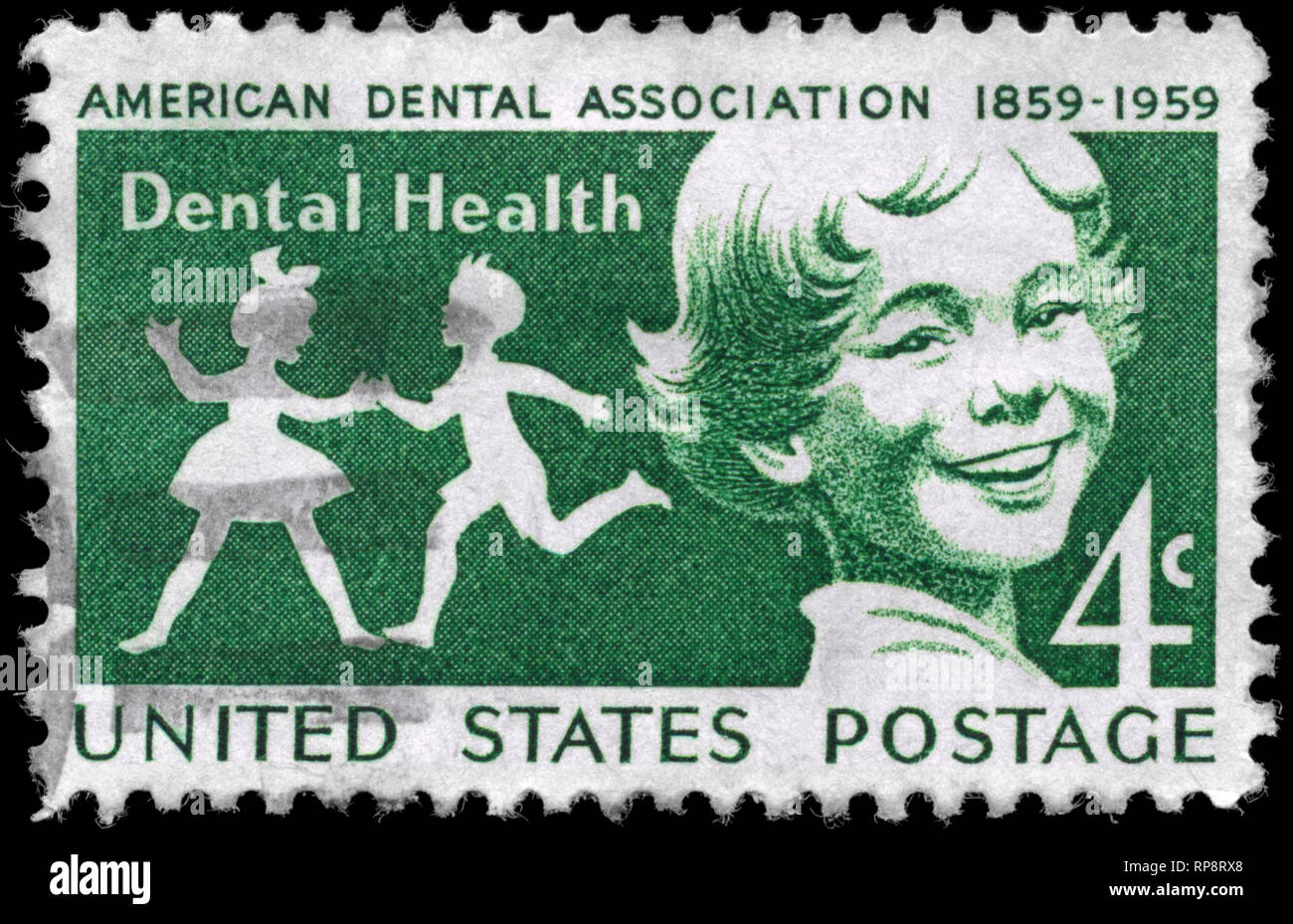 Stati Uniti - circa 1959: un timbro Stampato negli USA mostra un bambini, American Dental Association secolo, circa 1959 Foto Stock