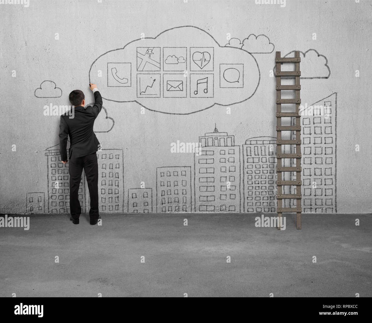 Imprenditore e permanente di disegno icona app con sky edifici scarabocchi sul muro di cemento sullo sfondo Foto Stock
