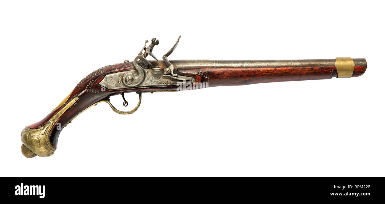 Vintage vecchio a pistola, flintlock pistola, visto dal lato, isolato su sfondo bianco Foto Stock
