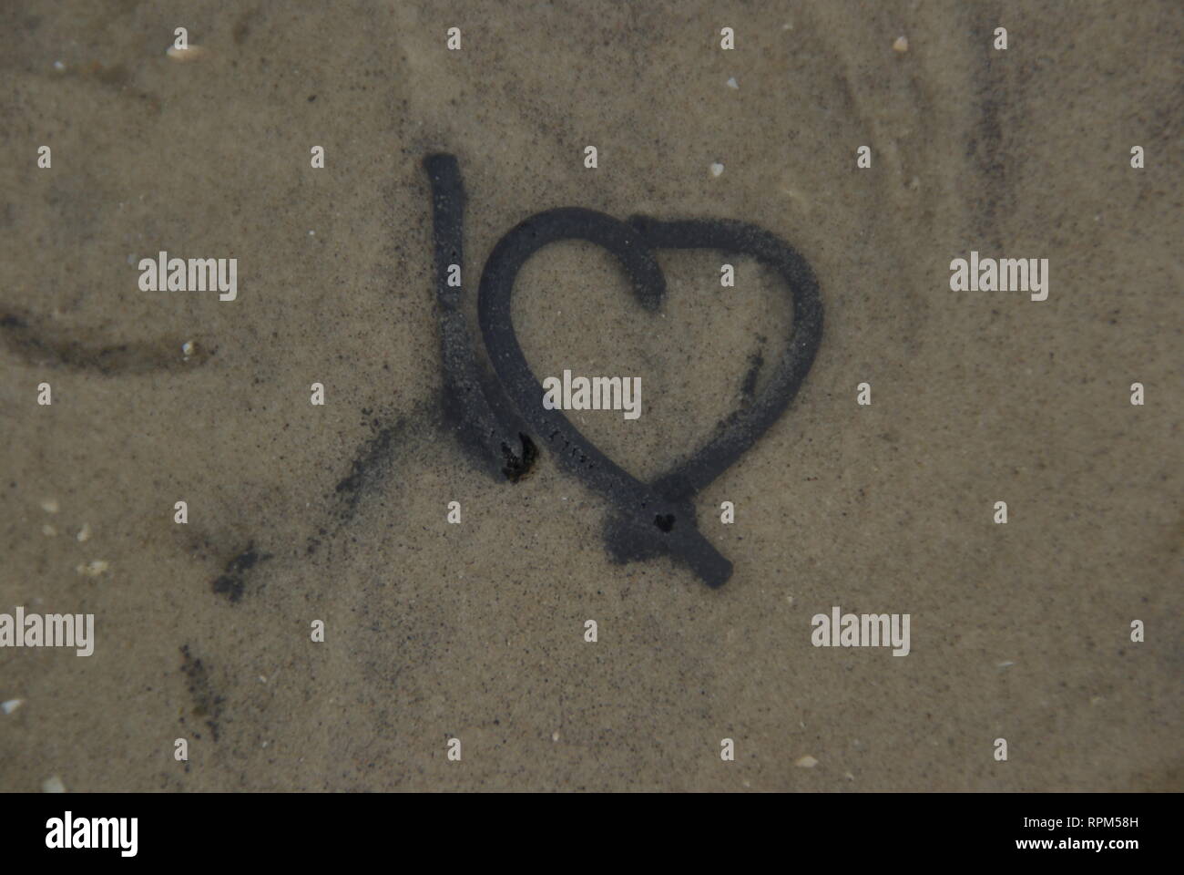 Bizzarro escrezione di un worm di roccia a forma di cuore Foto Stock