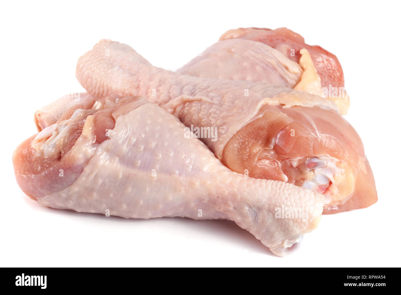 Tre materie pollo Cosce di pollo disossate isolati su sfondo bianco Foto Stock
