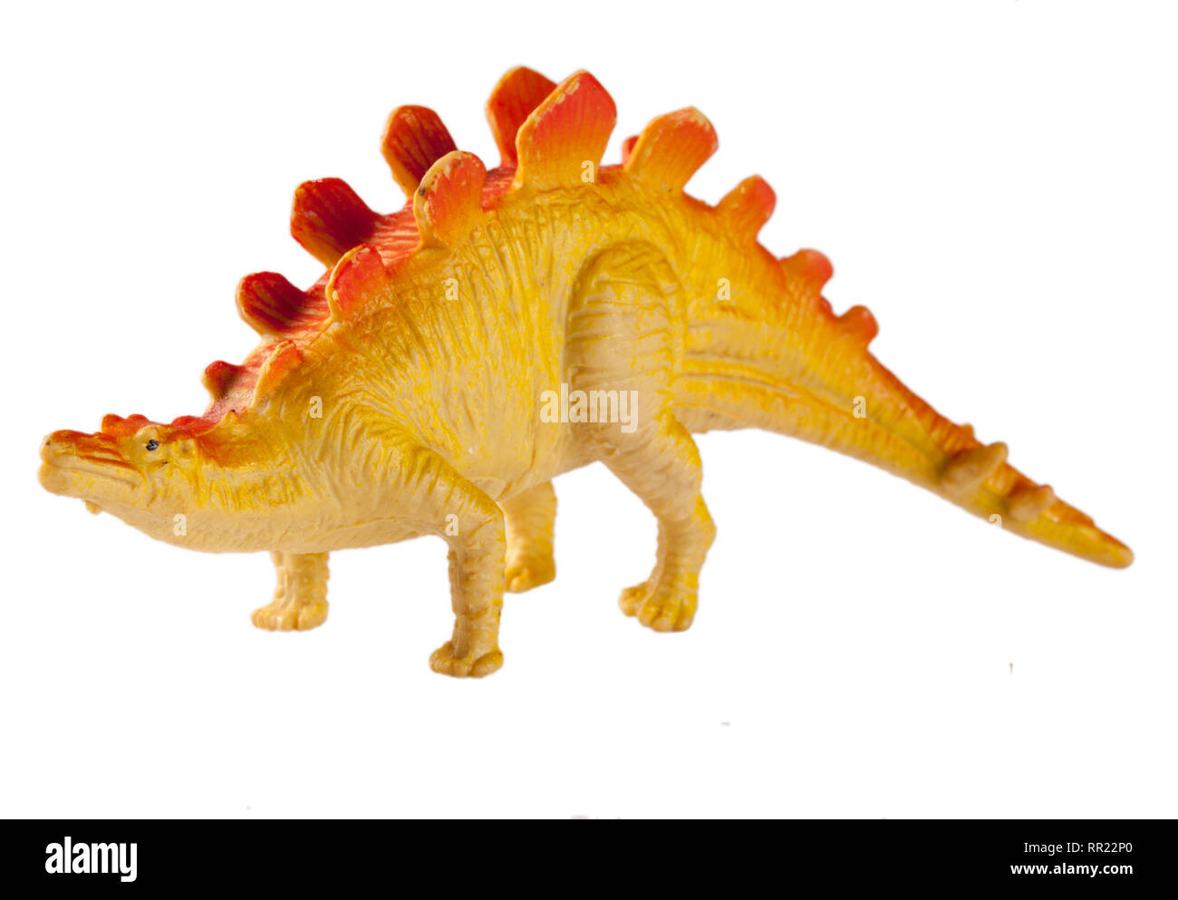 Plastica giocattolo dinosauro isolati su sfondo bianco Foto Stock