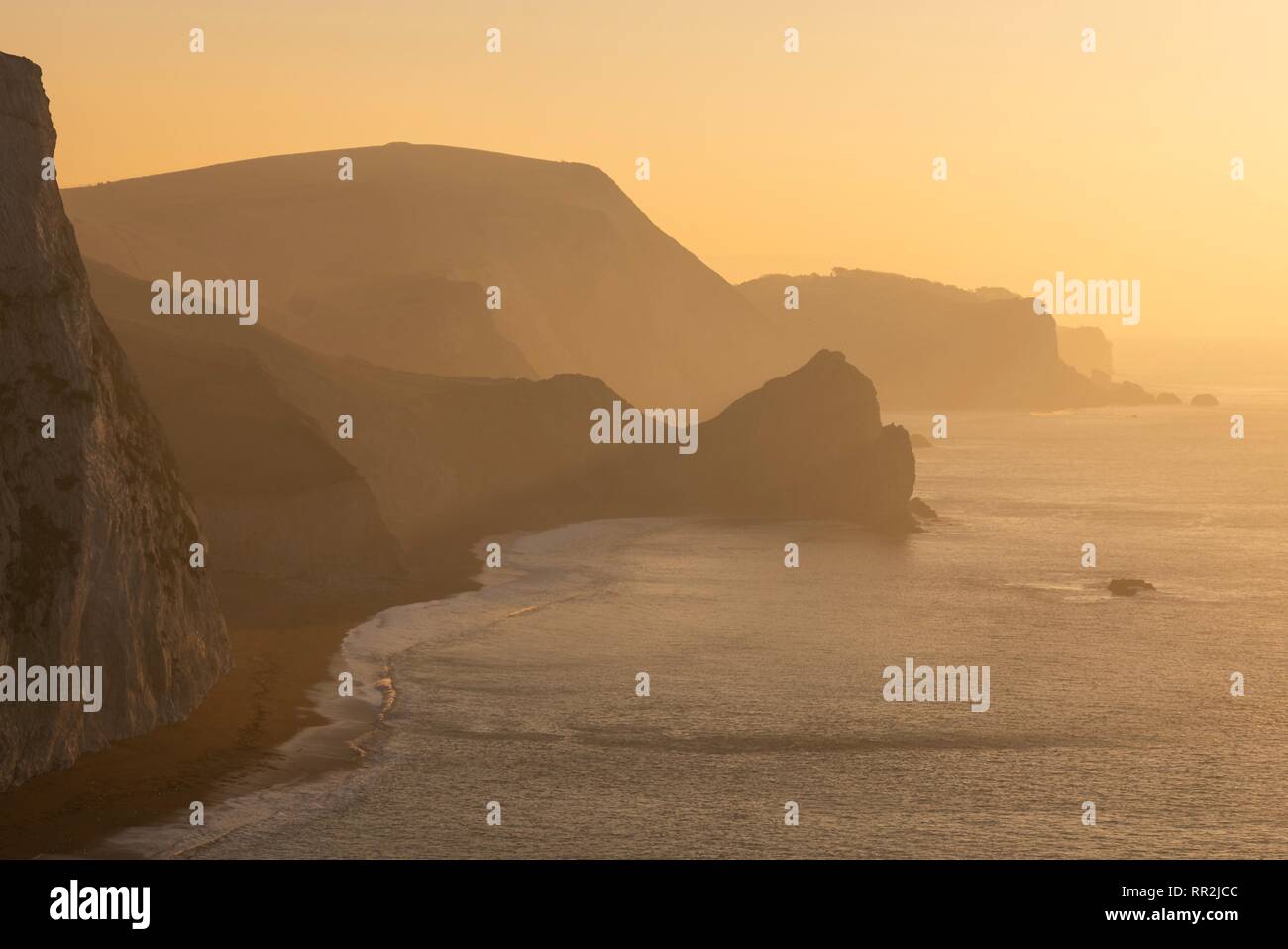Porta di Durdle, Dorset, Regno Unito. 24 feb 2019. Regno Unito Meteo. Freddo fresco sunrise sulla costa sud Credito: DTNews/Alamy Live News Foto Stock