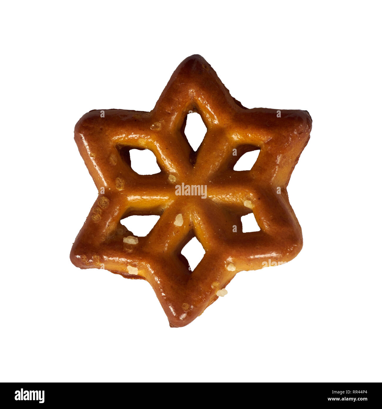 Pretzel raffigurante una stella isolata su uno sfondo bianco Foto Stock